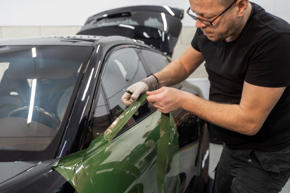 auto mechanic doing auto body repair